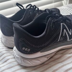 New Balance 860 Black and White Sneakers